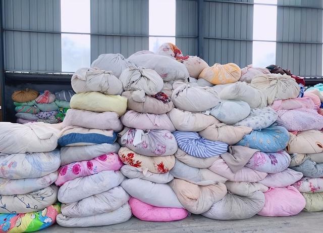 附近回收旧衣服上门电话，回收旧衣服的厂家联系方式